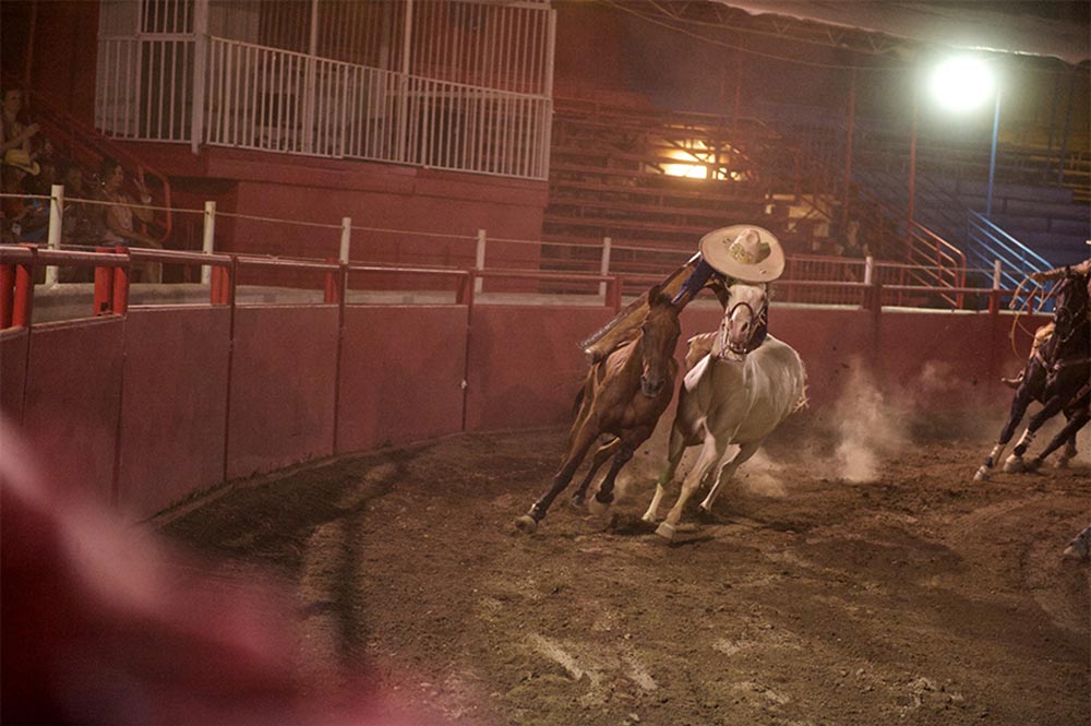 Corona Ranch Rodeo Show Trick Rider On Two Horses